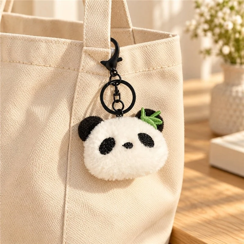 Illustrative application scene featuring bamboo panda face plush keychain; setting is a concept.