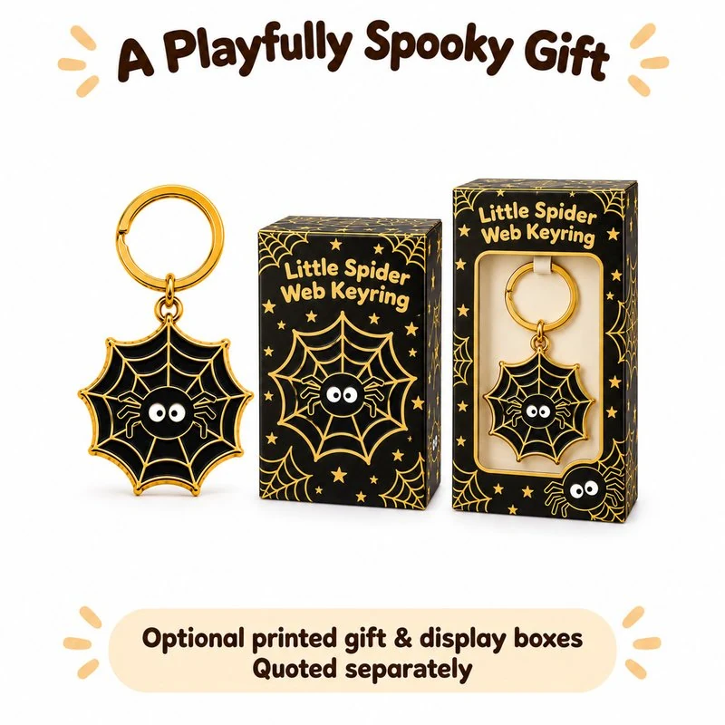 Black Gold Spider Web Keyring — optional packaging concept; final artwork, fit and quotation require confirmation.