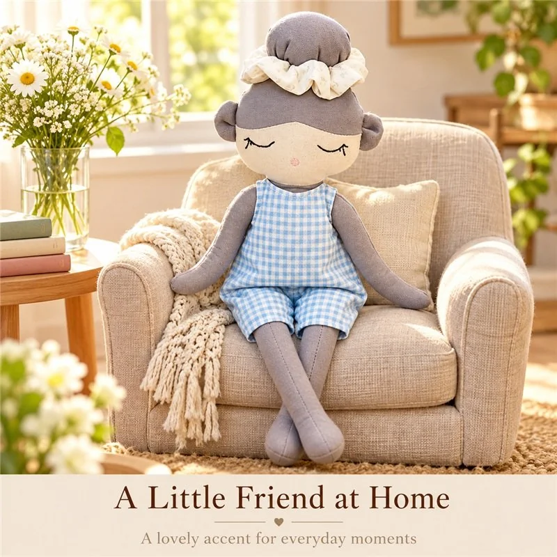 Illustrative application scene featuring blue gingham gray hair cloth doll; setting is a concept.