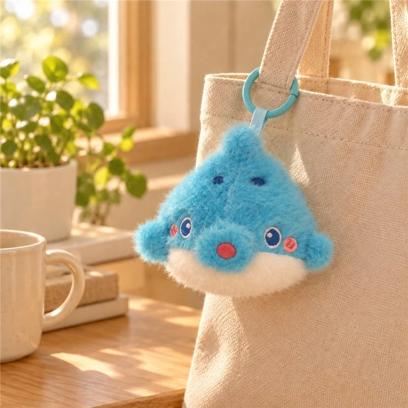 Illustrative application scene featuring blue spotted pufferfish plush keychain; setting is a concept.