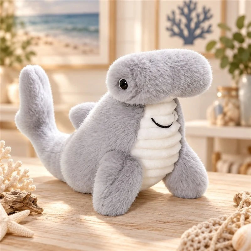 Illustrative application scene featuring hammerhead shark plush; setting is a concept.