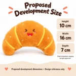 Laughing Croissant Plush Charm — proposed size reference; dimensions require sample confirmation.