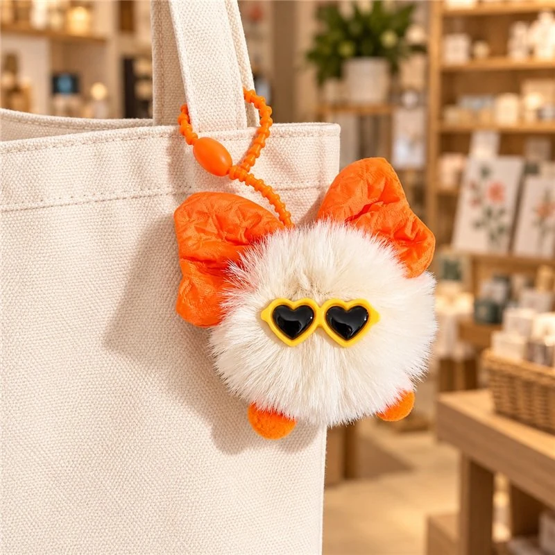 Illustrative application scene featuring orange bow heart glasses pompom keychain; setting is a concept.