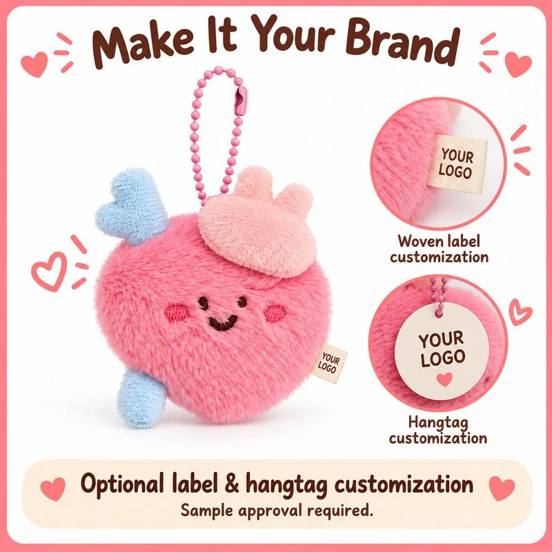 Customization concept for pink anatomical heart plush keychain; feasibility and sample approval required.