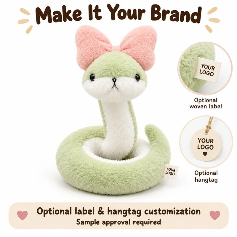 Customization concept for pink bow coiled snake plush; feasibility and sample approval required.